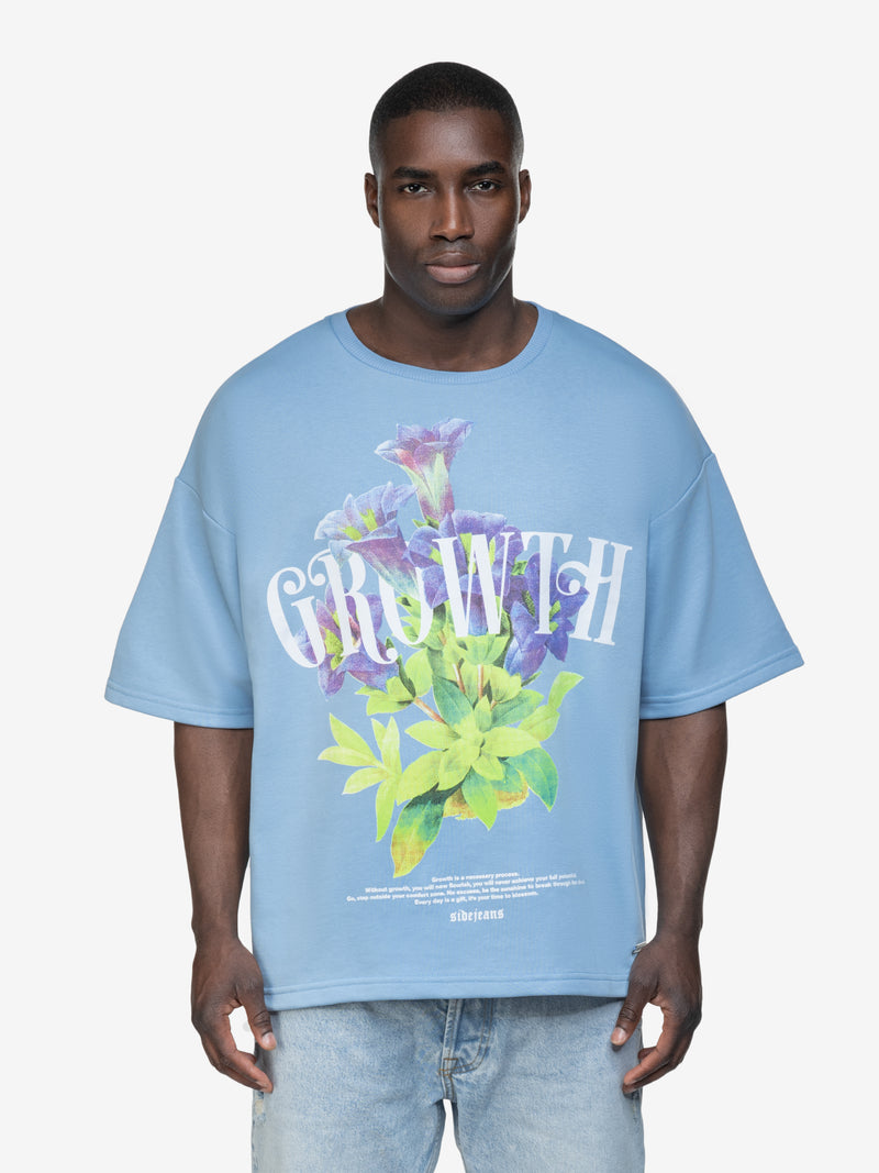 GROWTH FLOWER TEE BABYBLUE